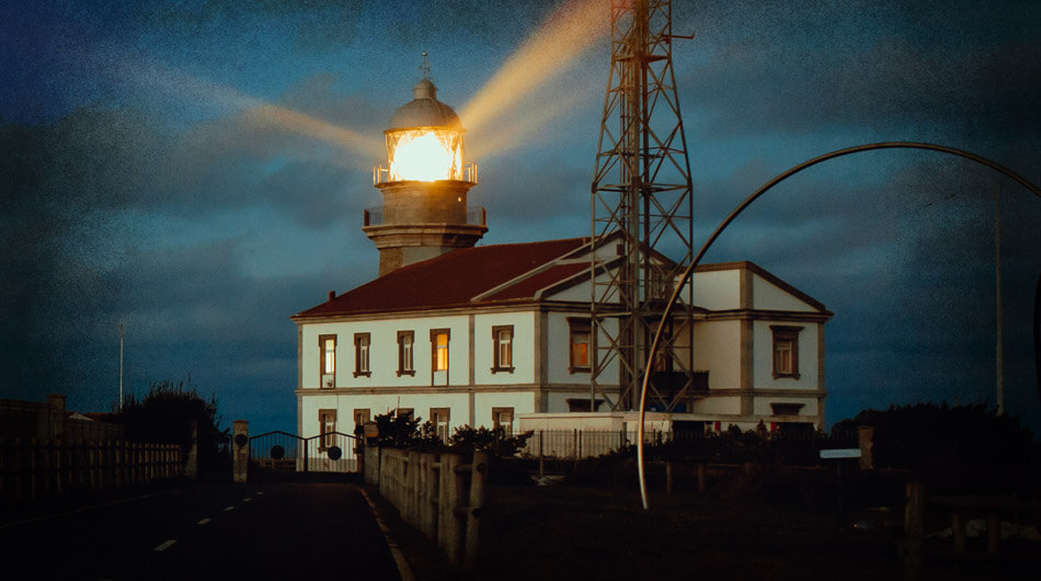 Haunted looking lighthouse at night in America
