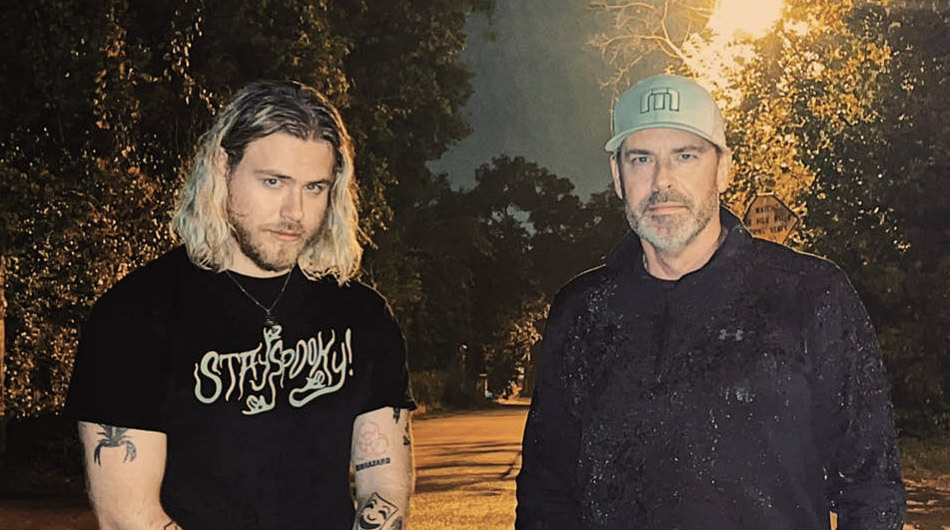 Youtube ghost hunters The Paranormal Files standing next to each other with tattoos.